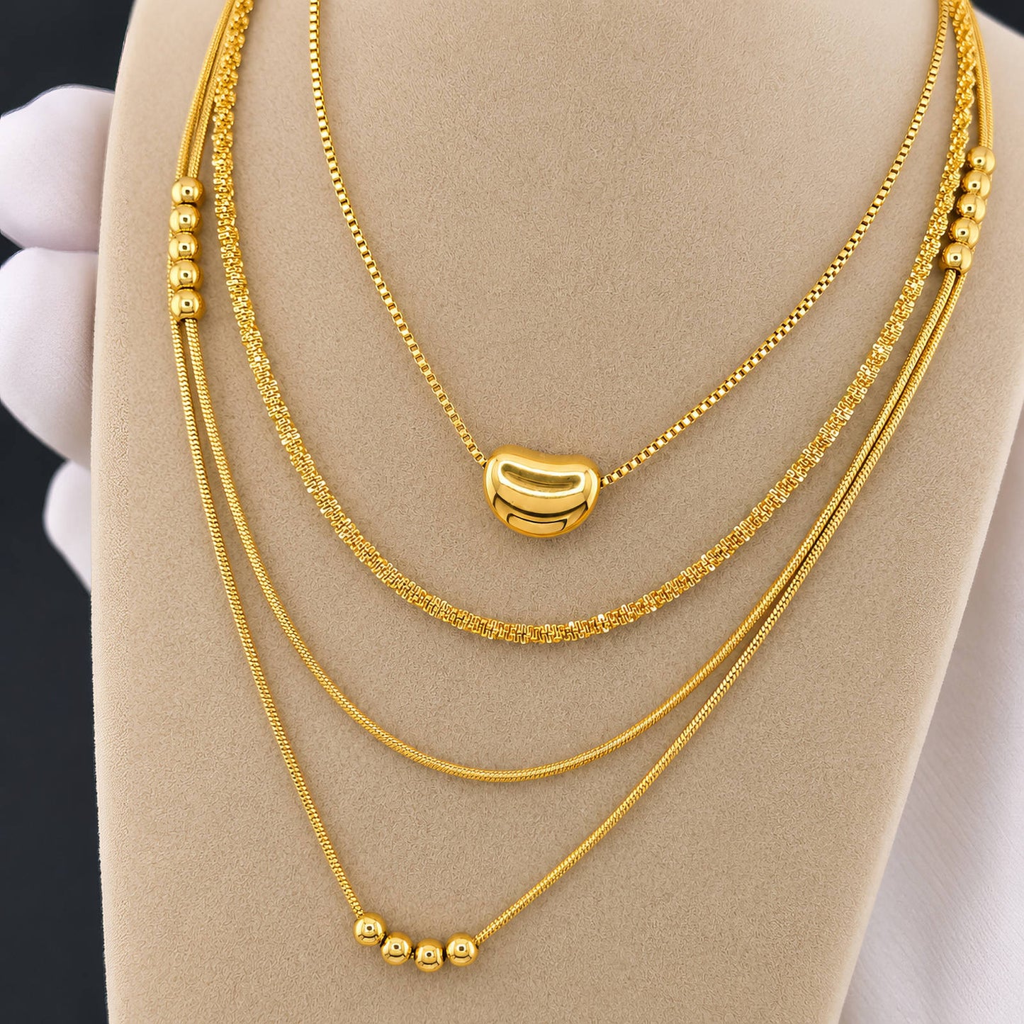 Collana doppia dorata con sferette