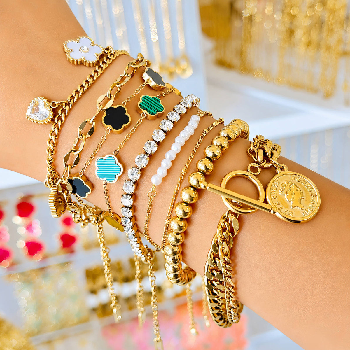 Bracciale dorato a doppia catena con moneta
